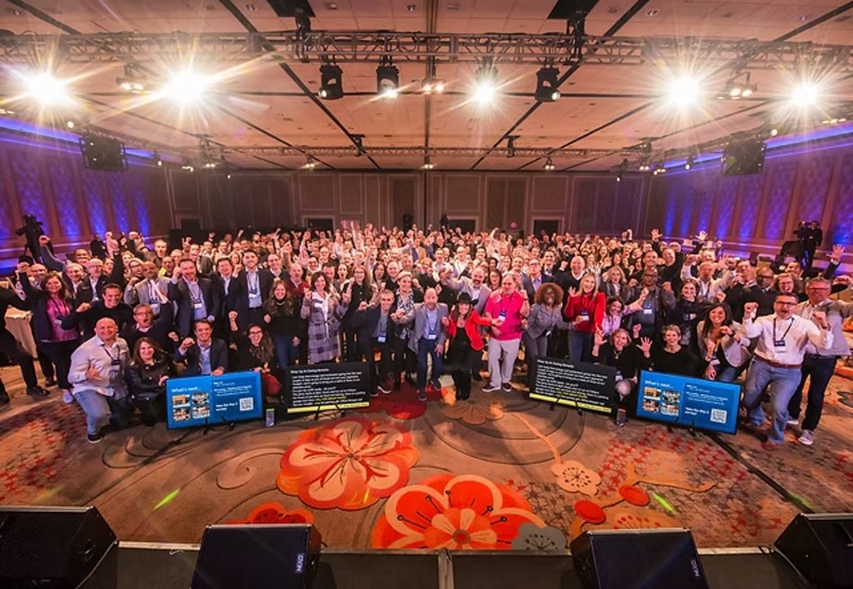 Corporate conference group photo captured at a luxury resort event in Arizona